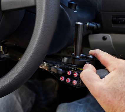 Hand-operated adaptive driving control